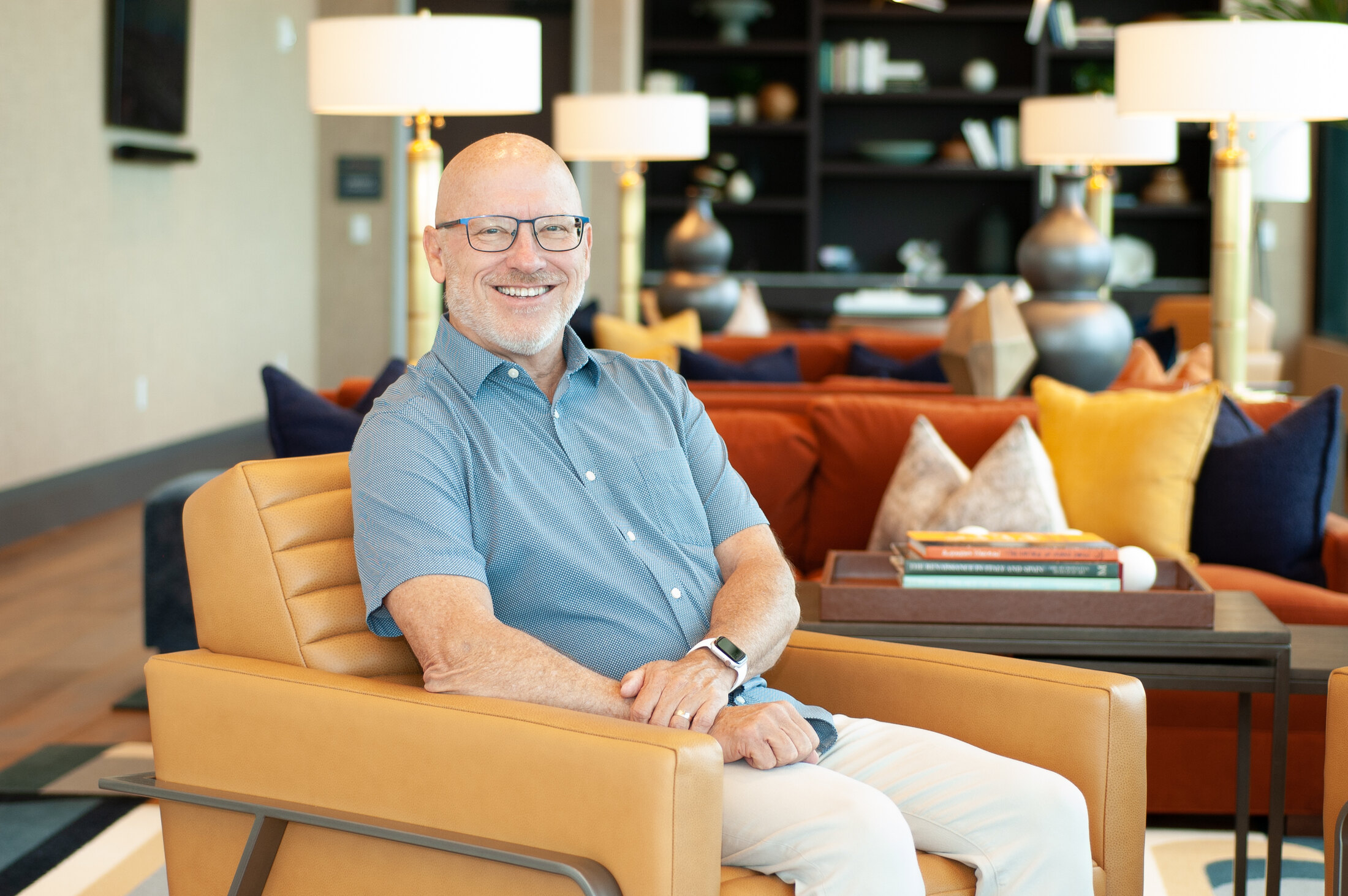 Brett Blair seated in a warm, welcoming setting